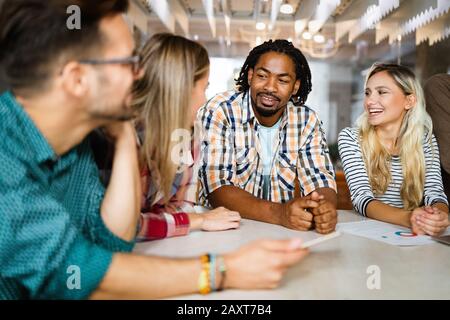 Business people designer architects teamwork brainstorming planning meeting concept Stock Photo