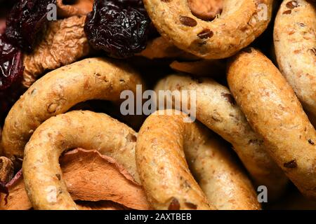 food as a background - whole grain wheat bagels with dried fruits Stock Photo