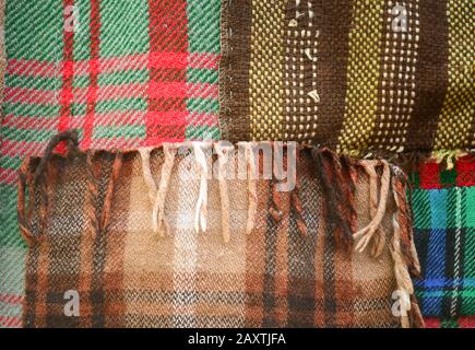 background multicolored old wool blanket stitched cell Stock Photo