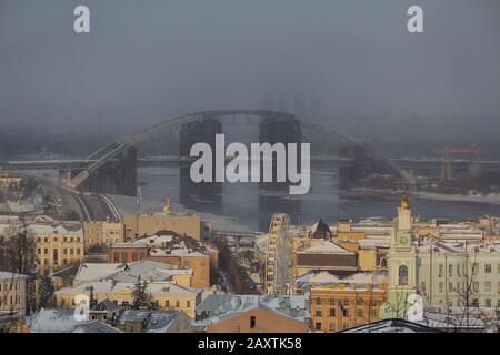 Unfinished Podilsko Voskresensky bridge in construction over a river taken.  Kiev, Ukraine Stock Photo