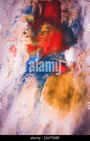abstract background basis dried streaks of multicolored paint with cracks, wrinkled old paper Stock Photo