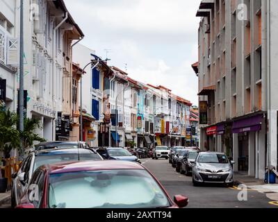 SINGAPORE – 5 JAN 2020 – Cars parked along the street alongside rows of old heritage shophouses in Tanjong Pagar, downtown Singapore, Southeast Asia Stock Photo