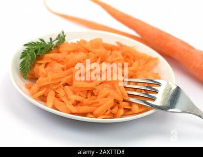 Grated carrots on a plate Stock Photo
