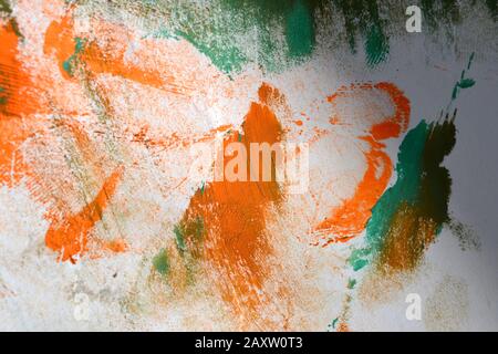 abstract background with green paint strokes of orange and white colors Stock Photo
