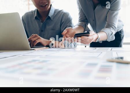 Programmer and UX UI designer working in a software development and coding technologies. Mobile and website design and programing development technolo Stock Photo