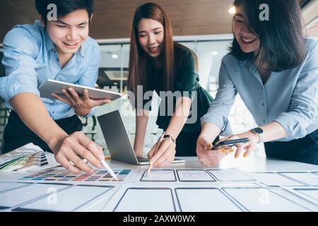 Programmer and UX UI designer working in a software development and coding technologies. Mobile and website design and programing development technolo Stock Photo