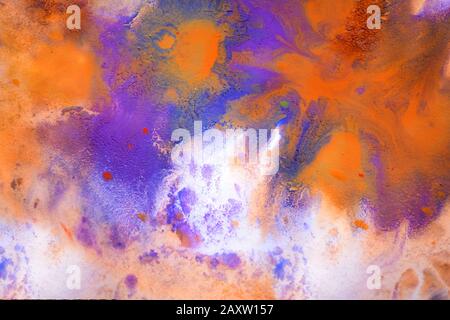 Multicolored paint stains, drips, splashes, mixing. Abstract colorful background Stock Photo