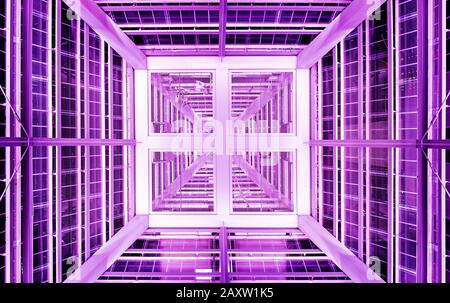 Abstract colorful background. Geometric structure sci-fi with magenta lights Stock Photo