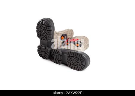 children's winter felt boots beige with a drawn car isolated on a white background Stock Photo