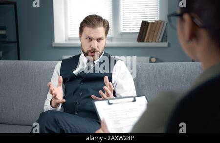 Patient speaking with psychologist Stock Photo