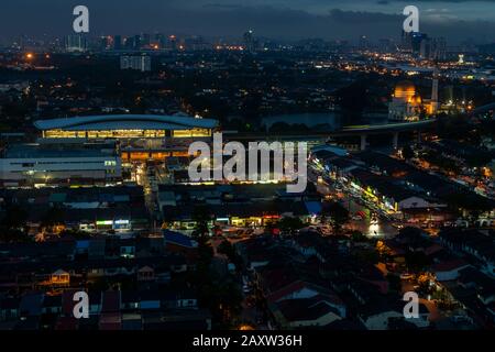 Twilight view of the Puchong Perdana town near Kuala Lumpur with the Masjid As-Salam Puchong Perdana Mosque in the background. Stock Photo