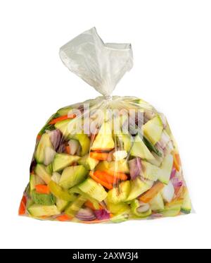 Fresh cut vegetables packed in a bag. Variety of cut and chopped fresh vegetables. Vegetables packaging. Stock Photo
