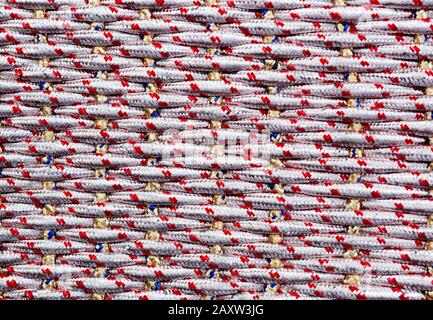 Seamless pattern of braids; endless texture. Texture for background; decor. Knitting line pattern. Stock Photo