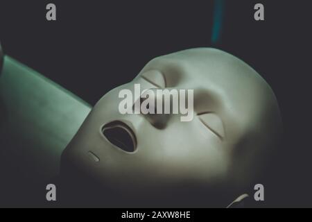 One Layout medical mannequin face man with open mouth close-up, medical exhibit Stock Photo