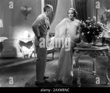 JOHN HALLIDAY and MARLENE DIETRICH in DESIRE 1936 director FRANK BORZAGE costumes Travis Banton producer Ernst Lubitsch Paramount Pictures Stock Photo