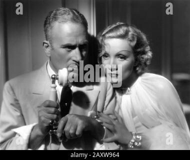 JOHN HALLIDAY and MARLENE DIETRICH in DESIRE 1936 director FRANK BORZAGE costumes Travis Banton producer Ernst Lubitsch Paramount Pictures Stock Photo