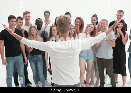 rear view. a happy leader standing in front of a creative business team Stock Photo