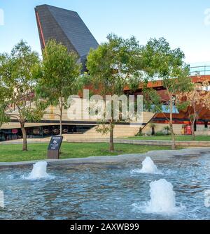 Waterline water sculpture by Jon Tarry sculptor at Yagan Square Perth CBD WA Australia. Stock Photo