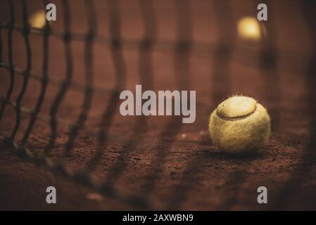 Tennisballs at clay court, bokeh shot Stock Photo