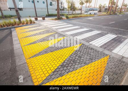 Modern bright pedestrian crosswalk. Urbanism and road safety concept Stock Photo