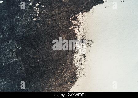 Strokes of black paint on a white background closeup. Copy space Stock Photo