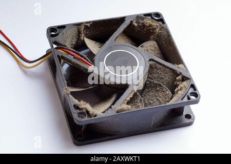 Dust and dirt. Fan removed from the personal computer. Stock Photo