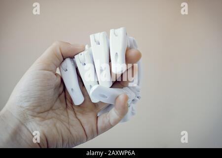 Robot hand fingers from plastic close-up conceptual handshake Stock Photo