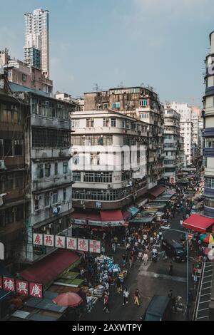 Hong Kong - November, 2019: Cityscape, and people on street market in Sham Shui Po, Hong Kong Stock Photo