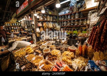 Hong Kong - November, 2019: Dry food selling shop inside street food market centre in Hong Kong Stock Photo