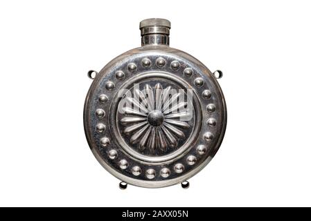 Old round canteen, made of stainless steel with patterns, isolated on a white background with a clipping path. Stock Photo