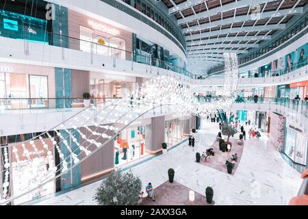 28 November 2019, UAE, Dubai: Interior of the biggest Dubai mall with various retail shops Stock Photo