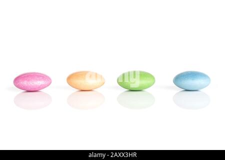 Group of four whole sweet colourful candy isolated on white background Stock Photo