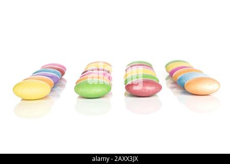 Group of four whole colourful hard candy cherry wine orange yellow ...