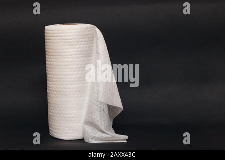 Roll of fabric napkins on a black background Stock Photo