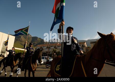 Mounted police officers parade ahead of President Cyril Ramaphosa's 2020 State of the Nation address at the South African Parliament in Cape Town Stock Photo
