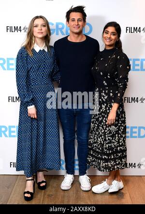 Sophie Cookson, Ollie Locke and Dinita Gohil attending the Greed special screening held at the Ham Yard Hotel, London Stock Photo