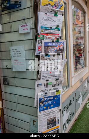 newspapers hanging in front of a store in lisbon portugal   lisbon newspapers, lisboa newspapers, portugal newspaper, portugal newspapers, shop, store Stock Photo