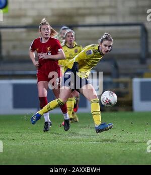 Deva Stadium, Chester, Cheshire, UK. 13th Feb, 2020. Womens Super League Football, Liverpool Womens versus Arsenal Womens; Vivianne Miedema of Arsenal Women crosses the ball as Rachel Furness of Liverpool closes in Credit: Action Plus Sports/Alamy Live News Stock Photo