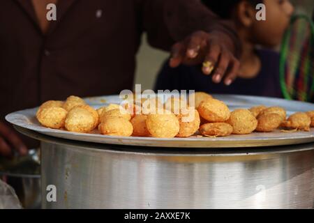 Fusca Chotpoti is Popular street food of Bangladesh and India. this food Looks like chips.a roadside shop Indian bengali food dish and pot.Testy and l Stock Photo