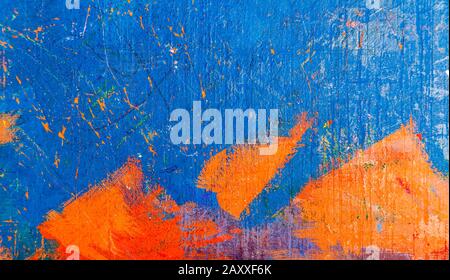 Orange blue wooden desk, knife cut board structure abstract background, top view, old vintage heavily used workshop table wood texture wallpaper Stock Photo