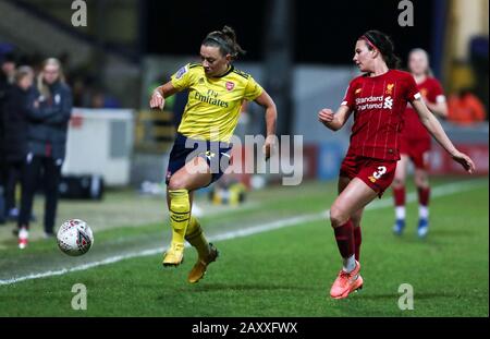 Deva Stadium, Chester, Cheshire, UK. 13th Feb, 2020. Womens Super League Football, Liverpool Womens versus Arsenal Womens; Katie McCabe of Arsenal Women runs down the wing tracked by Leighanne Robe of Liverpool Women Credit: Action Plus Sports/Alamy Live News Stock Photo