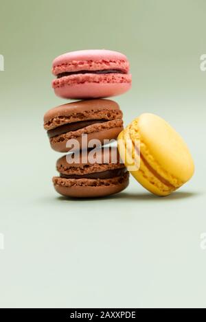 Front view of colorful macaroons on a marble countertop Stock Photo