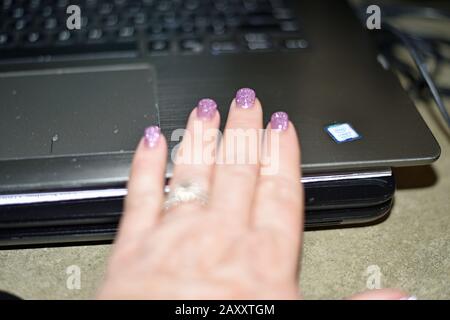Hand on Keyboard Stock Photo