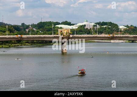 Kayakers paddling their kayaks near the Jabatan Perdana Menteri,  the official residence of the Prime Minister of Malaysia, located in Putrajaya, Mala Stock Photo