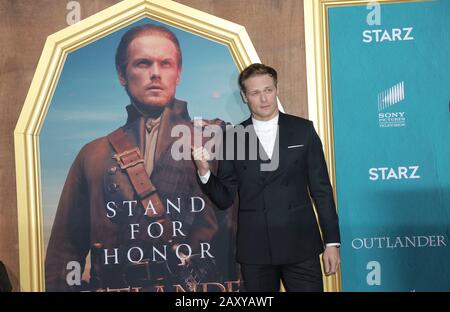 Sam Heughan walking the red carpet at the Starz Premiere Event For 'Outlander' Season 5 held at Hollywood Palladium on February 13, 2020 in Hollywood, California USA (Photo by Parisa Afsahi/Sipa USA) Stock Photo