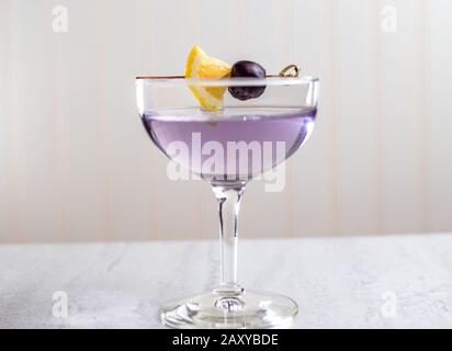 The Aviation cocktail is a prohibition era classic drink made with gin, maraschino liqueur, creme de violette and lemon juice Stock Photo