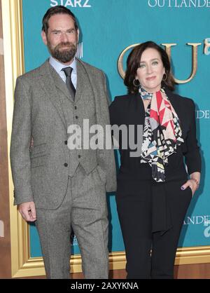 Hollywood, USA. 13th Feb, 2020. Duncan Lacroix, Maria Doyle Kennedy walking the red carpet at the Starz Premiere Event For 'Outlander' Season 5 held at Hollywood Palladium on February 13, 2020 in Hollywood, California USA (Photo by Parisa Afsahi/Sipa USA) Credit: Sipa USA/Alamy Live News Stock Photo