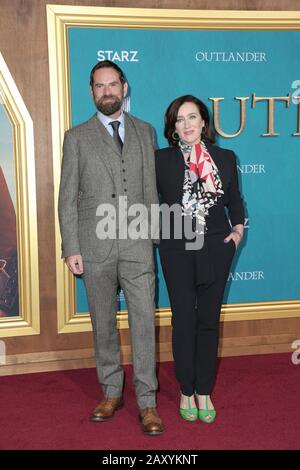 Hollywood, USA. 13th Feb, 2020. Duncan Lacroix, Maria Doyle Kennedy walking the red carpet at the Starz Premiere Event For 'Outlander' Season 5 held at Hollywood Palladium on February 13, 2020 in Hollywood, California USA (Photo by Parisa Afsahi/Sipa USA) Credit: Sipa USA/Alamy Live News Stock Photo