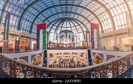 27 November 2019, UAE, Dubai: Panoramic view of the interior of the magnificent Emirates Mall, decorated for the celebration of national day Stock Photo