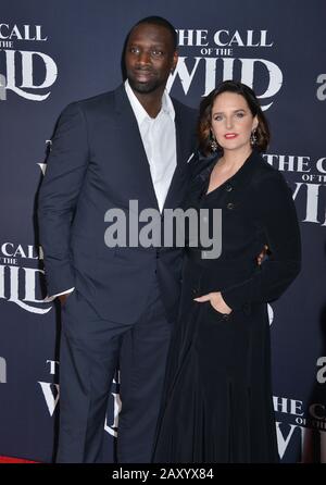 Los Angeles, USA. 13th Feb, 2020. Omar Sy, He?le?ne Sy attends the Premiere of 20th Century Studios' 'The Call of the Wild' at El Capitan Theatre on February 13, 2020 in Los Angeles, California. Credit: Tsuni/USA/Alamy Live News Stock Photo